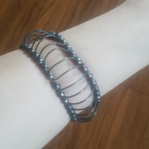 ** 2 for $13**Unique Silver Tone Elastic Bracelet